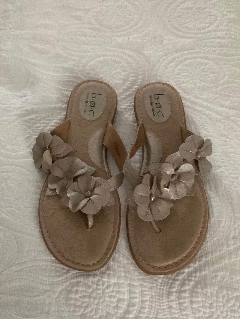 Metallic leather flip flops